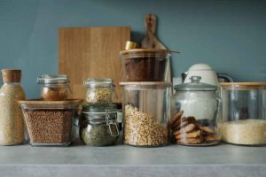 decluttering home kitchen clear jars store flour dry goods the linen duck